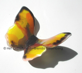 Glazen vlinder in abstract geel