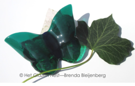 Groene vlinder van glas