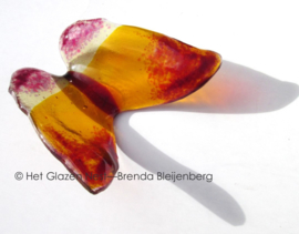 Oranje vlinder met roze accenten