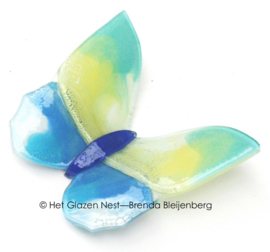 Glazen vlinder in zachte kleuren