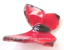 Kleine rode vlinder van grafkunst