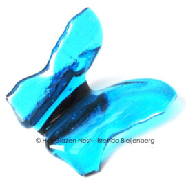 Aqua blauwe vlinder van glas