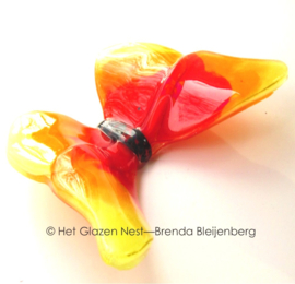 Glaskunst vlinder in oranje en geel
