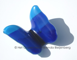 Klein speels blauw vlindertje