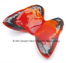 Kleine oranje vlinder met zwarte randen