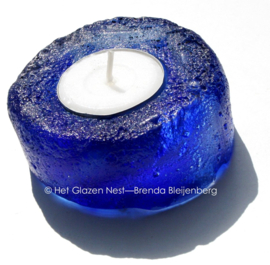 Waxinelichtje in blauw glas casting
