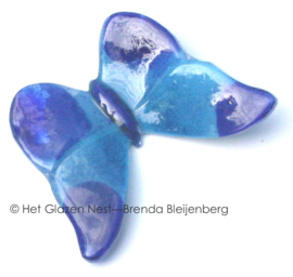 Kleine blauwe vlinder van glaskunst