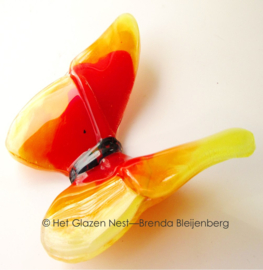 Glaskunst vlinder in oranje en geel