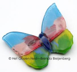 Glas vlinder in roze, blauw en groen