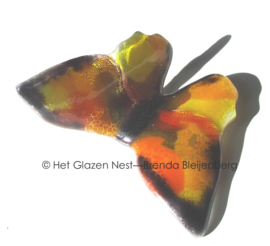 Glazen vlinder in abstract geel