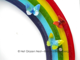 Regenboog met vlinders van glas