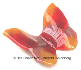 Roze en oranje vlinder van glaskunst