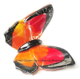 Kleine oranje vlinder van glaskunst