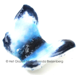 Glas vlinder in speels aqua, blauw en wit