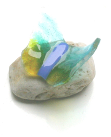 Zeer kleine vlinder in zeegroene kleuren
