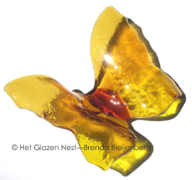 Gele vlinder van glas met gekartelde vleugels