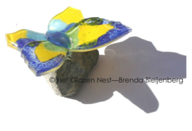 Speels kleurige vlinder van glas