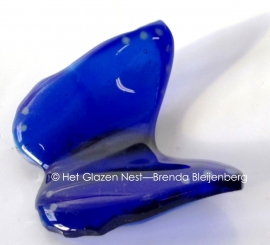 kleine vlinder in blauwe kleuren