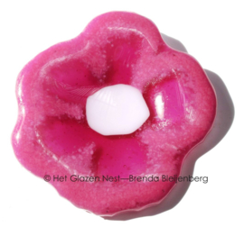 Bijzondere bloem in abstract roze glas