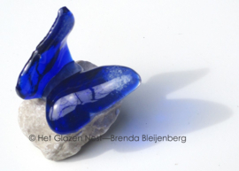 Kleine dansende blauwe vlinder