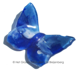 Kleine vlinder in blauwe tinten