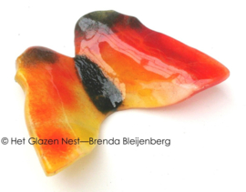 Glazen vlinder in abstract oranje