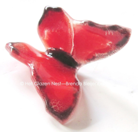 Kleine rode vlinder van grafkunst