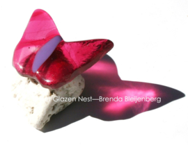 Kleine roze glazen vlinder