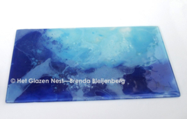 Glasplaat met blauwe lucht