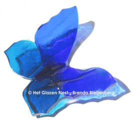 Blauwe glazen vlinder met spitse vleugels