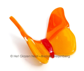 Glaskunst vlinder in rustig oranje