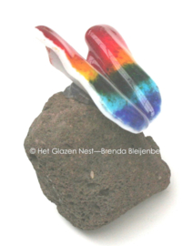Speelse regenboog vlinder als mini urn