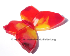 Glazen vlindertje in rood en oranje kleuren
