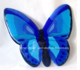 "vlakke" vlinder in blauw glas