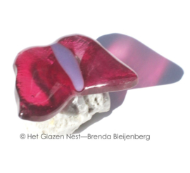 Kleine roze glazen vlinder