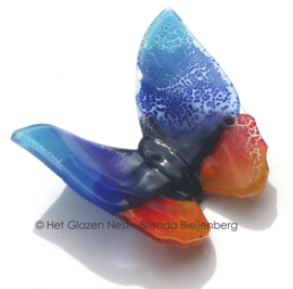 Glazen vlinder in blauw en oranje kleuren