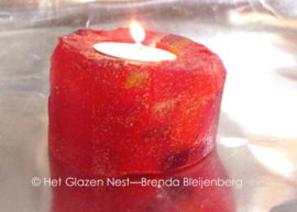 Waxinelichtje in rood glas