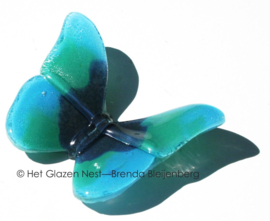 Zeegroene vlinder met ronde vleugels