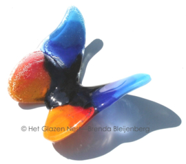 Vlinder in bijzondere kleuren van glas