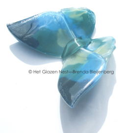 Grote vlinder in groenblauwe kleuren