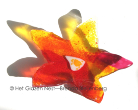 Speelse bloem in glas