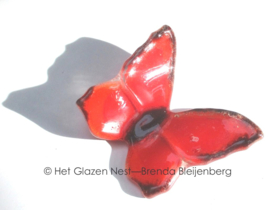 Kleine rode vlinder van grafkunst