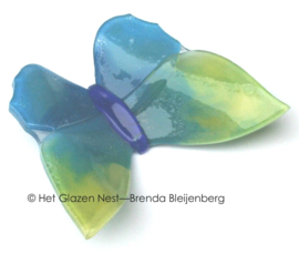 Vlinder van zeegroen en geel glas
