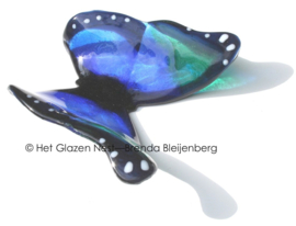 Speels glazen vlinder in blauw en zeegroen