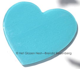 Hart in zee blauw glas