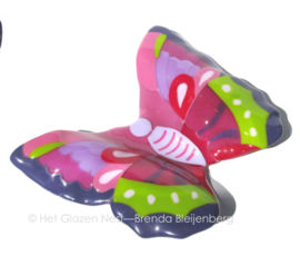 Grote vlinder in frisse roze, paars en groentinten