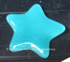 klein sterretje in licht zee blauw glas