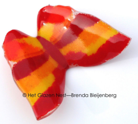 Glazen vlinder in oranje, rood en geel
