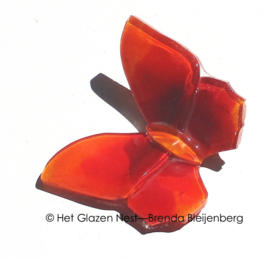 Glazen vlindertje in rood en oranje kleuren