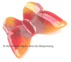 Roze en oranje vlinder van glaskunst